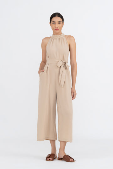 Yacht21, Yacht 21, yacht21, yacht 21, Y21, y21, womenswear, ladieswear, ladies, fashion, clothing, fuss-free, low ironing, wrinkle free, casual, easy, versatile, comfortable, occasion, sleeveless, pockets, sleek, halter neck, feminine, jumpsuit, beige, sash, self-tie, Priya Halter Neck Jumpsuit