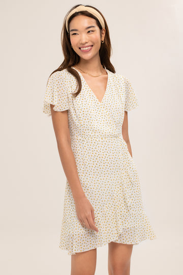 Adena Ruffle Dress - Yacht 21 - Y21 - Women ladies clothing fashion - urban resort wear , white and yellow , short dress , mini dress , knee length dresses , short sleeves , angel sleeves  , flare , flowy , polka dot design , a-line , v neckline , fuss free , low ironing , wrinkle free , wrinkle resistant , casual , vacay , vacation , staycay , staycation , holiday , summer , singapore brand , local brand , ruffles , floral , flowers , wrap dress